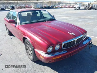 1998 Jaguar XJ with VIN SAJHX1243WC813314, listed as a IAAI auction lot 41332965 with Not Provided miles and . Bid and sale history available at DreamBid. Image 1.