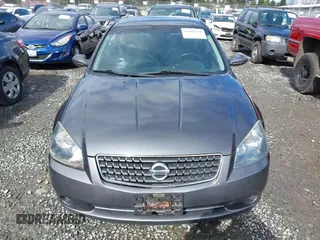 2006 Nissan Altima 2.5 with VIN 1N4AL11D06N304367, listed as a IAAI auction lot 41808294 with 198,815 mi miles. Bid and sale history available at carsss.com. Image 13.