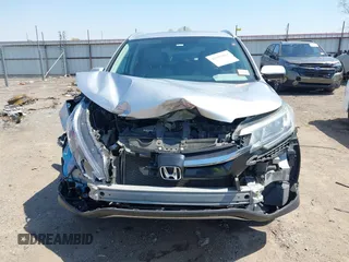 2015 Honda CR-V EX-L with VIN 2HKRM3H70FH552818, listed as a IAAI auction lot 41983061 with 202,898 mi miles and . Bid and sale history available at carsss.com. Image 13.