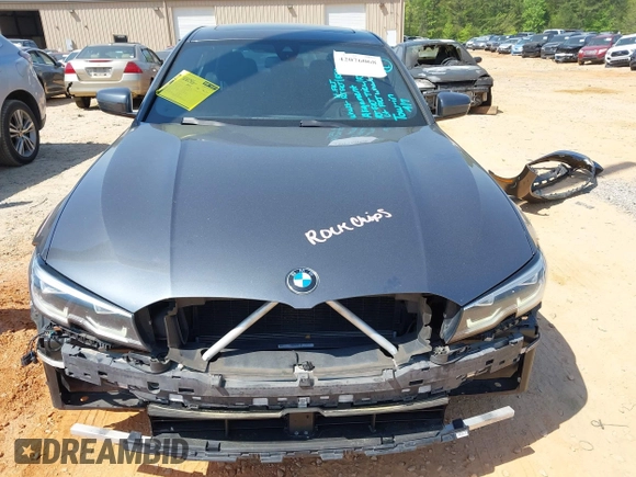 2019 BMW 3 Series 330i with VIN WBA5R1C5XKFH00567, listed as a IAAI auction lot 42076068 with 160,576 mi miles and . Bid and sale history available at DreamBid. Image 12.