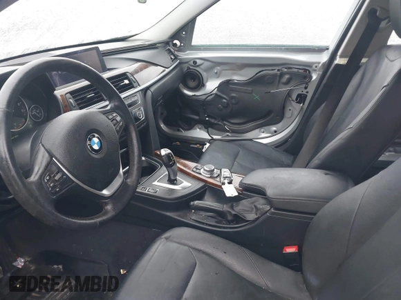 2013 BMW 3 Series 328i xDrive with VIN WBA3B5C58DF594087, listed as a IAAI auction lot 41710362 with 185,994 mi miles. Bid and sale history available at carsss.com. Image 5.