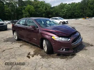 2013 Ford Fusion SE Hybrid z VIN 3FA6P0LU7DR197801, wystawiony jako Copart lot #60468095 z przebiegiem 169 215 mil mil oraz Szkoda całkowita • Salvage title. Historia ofert i sprzedaży dostępna na DreamBid. Obrazek 13.