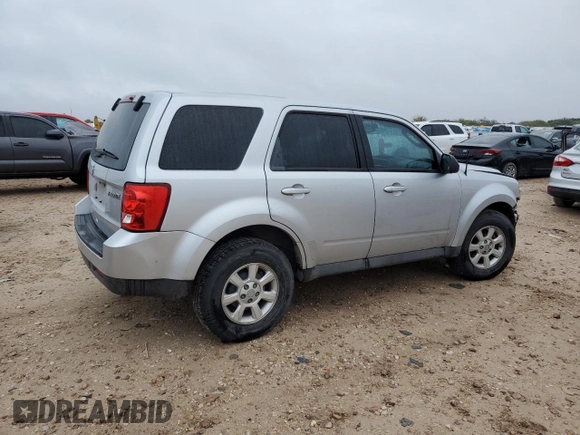 2011 Mazda Tribute Touring with VIN 4F2CY0C73BKM07056, listed as a Copart auction lot 85149404 with 138,265 mi miles and Salvage Title. Bid and sale history available at carsss.com. Image 3.