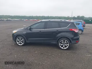 2015 Ford Escape Titanium z VIN 1FMCU0JX7FUB00462, wystawiony jako IAAI lot #42532943 z przebiegiem 88 623 mil mil oraz . Historia ofert i sprzedaży dostępna na DreamBid. Obrazek 14.