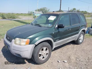2001 Ford Escape XLT with VIN 1FMYU04101KE97210, listed as a IAAI auction lot 42277209 with 173,335 mi miles and . Bid and sale history available at DreamBid. Image 2.