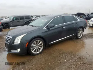 2014 Cadillac XTS Luxury with VIN 2G61M5S35E9173574, listed as a Copart auction lot 60644005 with 163,431 mi miles and Salvage title. Bid and sale history available at DreamBid. Image 1.