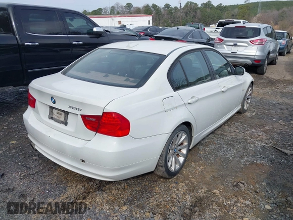 2011 BMW 3 Series 328i with VIN WBAPH7G50BNM55631, listed as a IAAI auction lot 41708771 with 196,086 mi miles. Bid and sale history available at carsss.com. Image 4.