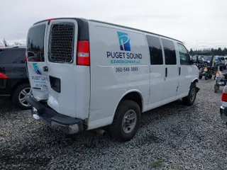 2019 Chevrolet Express Cargo Van with VIN 1GCWGAFG0K1346126, listed as a IAAI auction lot 41764267 with 63,697 mi miles. Bid and sale history available at carsss.com. Image 4.