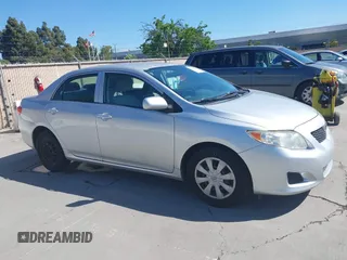 2009 Toyota Corolla with VIN JTDBL40E899057154, listed as a IAAI auction lot 42200165 with 200,545 mi miles. Bid and sale history available at carsss.com. Image 1.