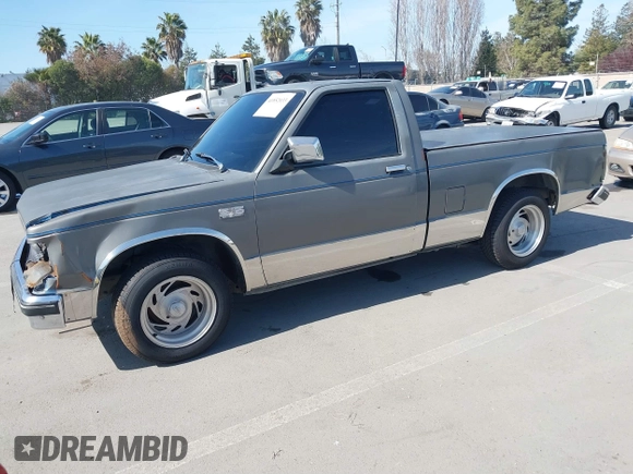 1987 GMC Sonoma with VIN 1GTBS14E2H8501760, listed as a IAAI auction lot 41852033 with 175,529 mi miles and . Bid and sale history available at DreamBid. Image 2.