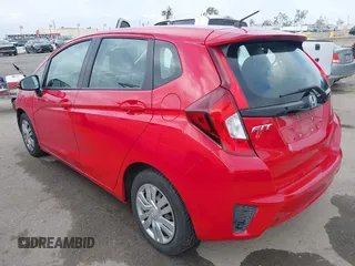 2015 Honda Fit LX with VIN 3HGGK5H52FM762596, listed as a IAAI auction lot 42129871 with 62,323 mi miles and . Bid and sale history available at DreamBid. Image 3.