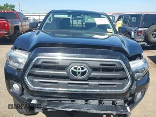 2017 Toyota Tacoma SR z VIN 5TFSX5EN4HX056886, wystawiony jako IAAI lot #42264479 z przebiegiem 97 895 mil mil oraz . Historia ofert i sprzedaży dostępna na DreamBid. Obrazek 13.