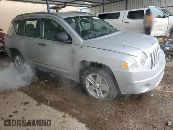 2010 Jeep Compass Sport with VIN 1J4NF4FB6AD521894, listed as a Copart auction lot 46027325 with 149,230 mi miles and Salvage Title. Bid and sale history available at carsss.com. Image 4.