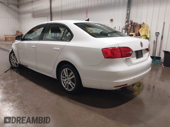 2011 Volkswagen Jetta SE z VIN 3VWDZ7AJ9BM323290, wystawiony jako IAAI lot #41877681 z przebiegiem 115 307 mil mil oraz . Historia ofert i sprzedaży dostępna na DreamBid. Obrazek 3.