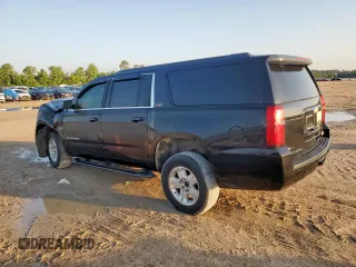 2020 Chevrolet Suburban LT with VIN 1GNSKHKC9LR102624, listed as a Copart auction lot 58970995 with 76,132 mi miles and Salvage title. Bid and sale history available at DreamBid. Image 2.