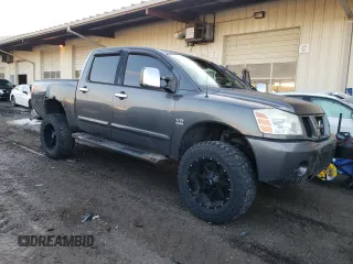 2004 Nissan Titan LE with VIN 1N6AA07A64N562975, listed as a Copart auction lot 85230234 with 99,973 mi miles and Salvage Title. Bid and sale history available at DreamBid. Image 4.