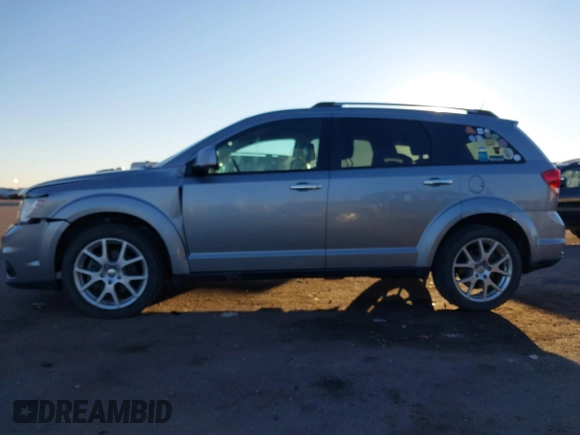 2016 Dodge Journey R/T with VIN 3C4PDDFG8GT106014, listed as a IAAI auction lot 40653735 with 173,413 mi miles and . Bid and sale history available at DreamBid. Image 14.