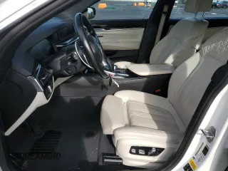 2019 BMW 6 Series 640i xDrive with VIN WBAJV6C52KBK08045, listed as a Copart auction lot 76004384 with 56,730 mi miles and Salvage Title. Bid and sale history available at carsss.com. Image 7.