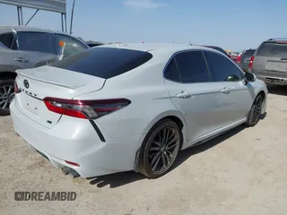 2023 Toyota Camry SE z VIN 4T1G11AK2PU128367, wystawiony jako IAAI lot #41699516 z przebiegiem 27 270 mil mil oraz . Historia ofert i sprzedaży dostępna na DreamBid. Obrazek 4.