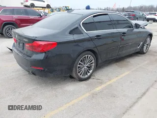 2019 BMW 5 Series 530i xDrive with VIN WBAJA7C50KWW38148, listed as a IAAI auction lot 41707858 with Not Provided miles and . Bid and sale history available at DreamBid. Image 4.