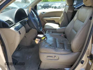 2005 Honda Odyssey EX-L with VIN 5FNRL38625B045152, listed as a Copart auction lot 57633005 with 145,776 mi miles and Salvage title. Bid and sale history available at DreamBid. Image 7.