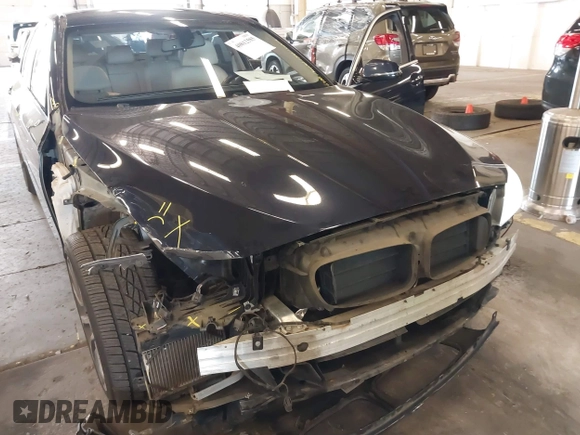 2014 BMW 5 Series 535i with VIN WBA5B1C54ED477539, listed as a IAAI auction lot 40812585 with 94,541 mi miles and . Bid and sale history available at DreamBid. Image 6.
