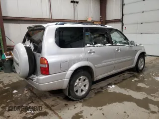2003 Suzuki XL7 Touring z VIN JS3TX92V534106982, wystawiony jako Copart lot #85931744 z przebiegiem 307 709 mil mil oraz Szkoda całkowita • Salvage title. Historia ofert i sprzedaży dostępna na DreamBid. Obrazek 3.