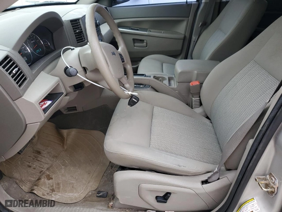2007 Jeep Grand Cherokee Laredo with VIN 1J8GR48K97C609350, listed as a Copart auction lot 43913885 with 195,125 mi miles and Salvage Title. Bid and sale history available at carsss.com. Image 7.