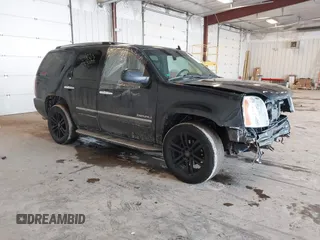 2011 GMC Yukon Denali with VIN 1GKS2EEF2BR258374, listed as a IAAI auction lot 41653820 with 227,468 mi miles. Bid and sale history available at carsss.com. Image 1.