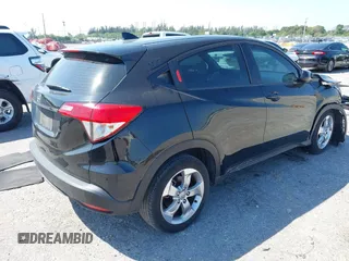 2021 Honda HR-V LX with VIN 3CZRU5H34MM726934, listed as a IAAI auction lot 41797859 with 139,927 mi miles. Bid and sale history available at carsss.com. Image 4.