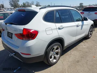 2014 BMW X1 sDrive28i with VIN WBAVM1C5XEVW53725, listed as a IAAI auction lot 41859427 with 181,892 mi miles. Bid and sale history available at carsss.com. Image 4.