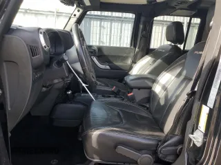 2018 Jeep Wrangler JK Unlimited Rubicon with VIN 1C4BJWFG0JL899973, listed as a Copart auction lot 41428895 with 88,357 mi miles and Salvage Title. Bid and sale history available at carsss.com. Image 7.