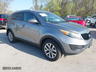2015 Kia Sportage LX with VIN KNDPBCAC5F7674874, listed as a IAAI auction lot 41983381 with 163,191 mi miles. Bid and sale history available at carsss.com. Image 1.