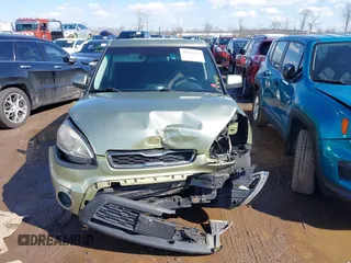 2012 Kia Soul + with VIN KNDJT2A65C7403543, listed as a IAAI auction lot 41633273 with 128,988 mi miles. Bid and sale history available at carsss.com. Image 12.