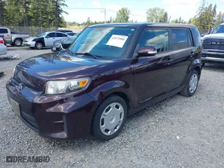 2011 Scion xB with VIN JTLZE4FE0B1131417, listed as a IAAI auction lot 42072008 with 130,666 mi miles. Bid and sale history available at carsss.com. Image 2.