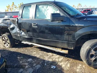 2014 Ford F-150 XL with VIN 1FTFX1CF0EFD04042, listed as a IAAI auction lot 40848373 with 164,631 mi miles. Bid and sale history available at carsss.com. Image 14.