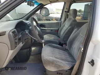 2000 Chevrolet Venture LT 1SD z VIN 1GNDX03E3YD337987, wystawiony jako Copart lot #71485544 z przebiegiem 223 183 mil mil oraz Szkody całkowita. Historia ofert i sprzedaży dostępna na DreamBid. Obrazek 7.