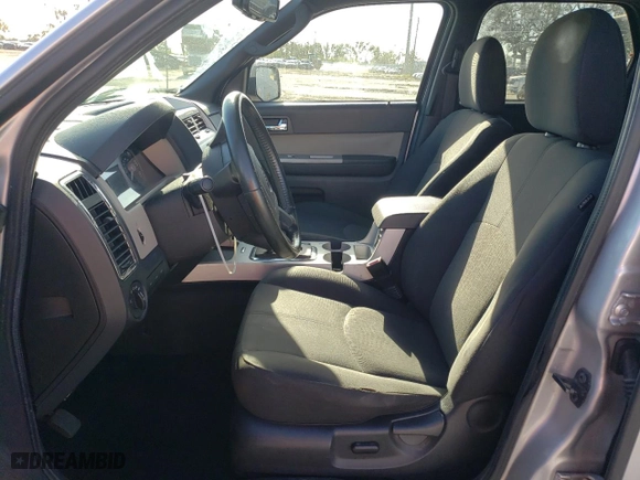 2011 Mercury Mariner with VIN 4M2CN9BG0BKJ00565, listed as a Copart auction lot 75045024 with 125,735 mi miles and Salvage Title. Bid and sale history available at carsss.com. Image 7.