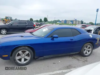2012 Dodge Challenger SXT Plus z VIN 2C3CDYAG9CH239160, wystawiony jako IAAI lot #42198261 z przebiegiem 116 546 mil mil oraz . Historia ofert i sprzedaży dostępna na DreamBid. Obrazek 14.
