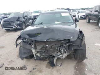 2014 Cadillac ATS Standard RWD with VIN 1G6AA5RA1E0108650, listed as a IAAI auction lot 42268622 with 99,703 mi miles and . Bid and sale history available at DreamBid. Image 6.