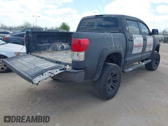 2013 Toyota Tundra 4WD Truck with VIN 5TFDW5F14DX279527, listed as a IAAI auction lot 41594899 with 212,973 mi miles. Bid and sale history available at carsss.com. Image 4.