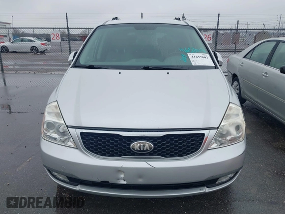 2014 Kia Sedona EX with VIN KNDMH4C76E6541200, listed as a IAAI auction lot 41657002 with 141,377 mi miles. Bid and sale history available at carsss.com. Image 6.