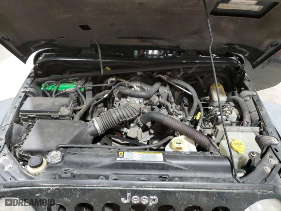2010 Jeep Wrangler Unlimited Rubicon with VIN 1J4BA6H12AL177942, listed as a Copart auction lot 80460894 with 63,668 mi miles and Salvage Title. Bid and sale history available at carsss.com. Image 12.