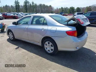 2010 Toyota Corolla with VIN 2T1BU4EEXAC298637, listed as a IAAI auction lot 42036415 with 103,885 mi miles. Bid and sale history available at carsss.com. Image 3.