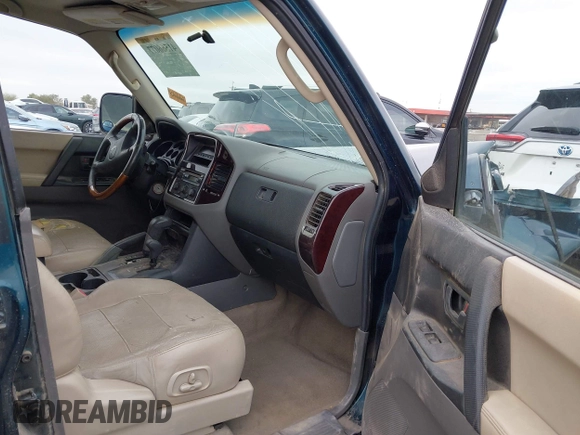 2002 Mitsubishi Montero Limited z VIN JA4MW51RX2J040586, wystawiony jako IAAI lot #41566077 z przebiegiem 149 851 mil mil oraz . Historia ofert i sprzedaży dostępna na DreamBid. Obrazek 5.