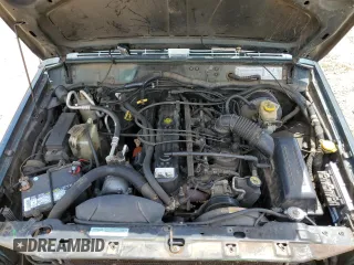 2001 Jeep Cherokee Sport with VIN 1J4FT48SX1L590135, listed as a Copart auction lot 53502945 with 362,941 mi miles and Non Repairable. Bid and sale history available at carsss.com. Image 12.