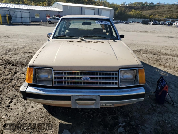 1983 Ford Escort z VIN 2FABP1347DX161788, wystawiony jako Copart lot #76347694 z przebiegiem 58 514 mil mil oraz Szkoda całkowita • Salvage title. Historia ofert i sprzedaży dostępna na DreamBid. Obrazek 5.