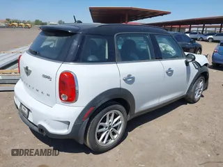 2016 MINI Countryman S with VIN WMWZC3C54GWT08011, listed as a IAAI auction lot 42274242 with 99,183 mi miles and . Bid and sale history available at DreamBid. Image 4.