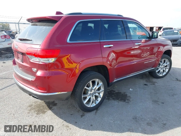 2014 Jeep Grand Cherokee Summit with VIN 1C4RJFJG6EC328516, listed as a IAAI auction lot 40698068 with 195,798 mi miles and . Bid and sale history available at DreamBid. Image 4.