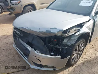 2014 Audi A4 Premium z VIN WAUAFAFLXEN017518, wystawiony jako IAAI lot #42276002 z przebiegiem 139 906 mil mil oraz . Historia ofert i sprzedaży dostępna na DreamBid. Obrazek 12.